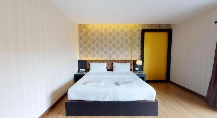 Bed in The Y Boutique Hotel