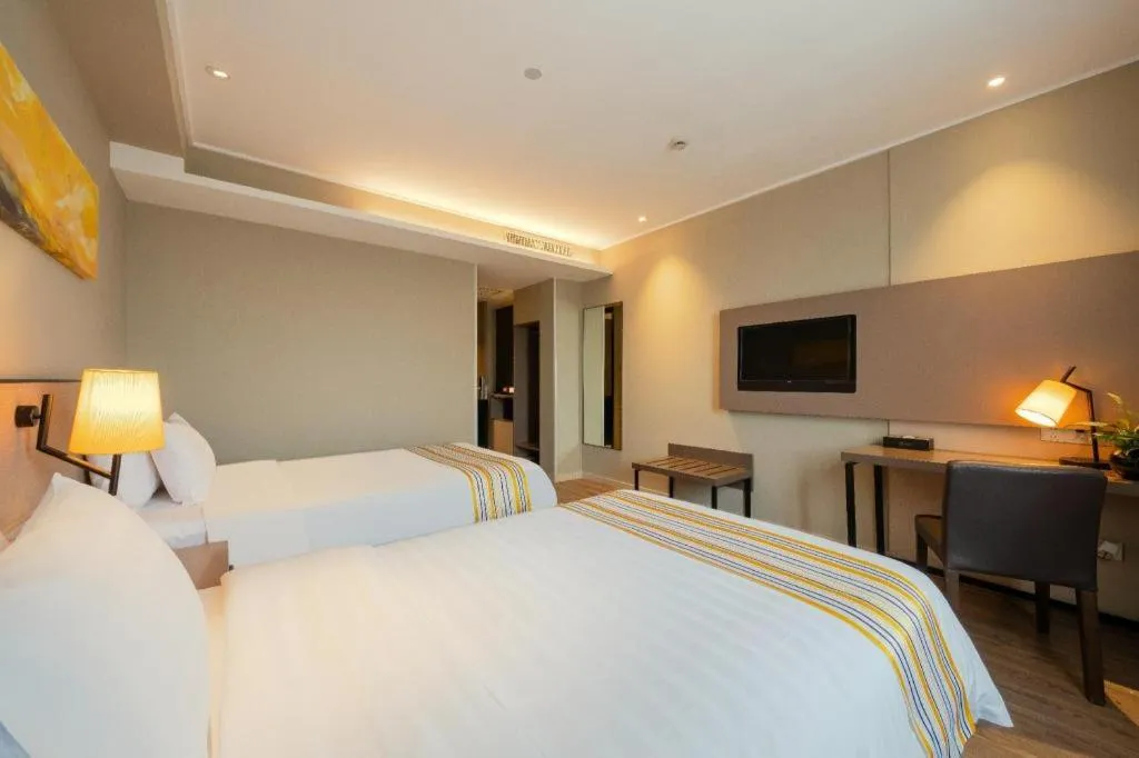 Bed in Home Inn Plus Shanghai Pudong Airport Chuansha Branch
