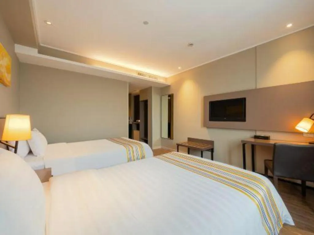 Bed in Home Inn Plus Shanghai Pudong Airport Chuansha Branch