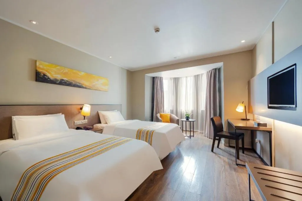 Bed in Home Inn Plus Shanghai Pudong Airport Chuansha Branch