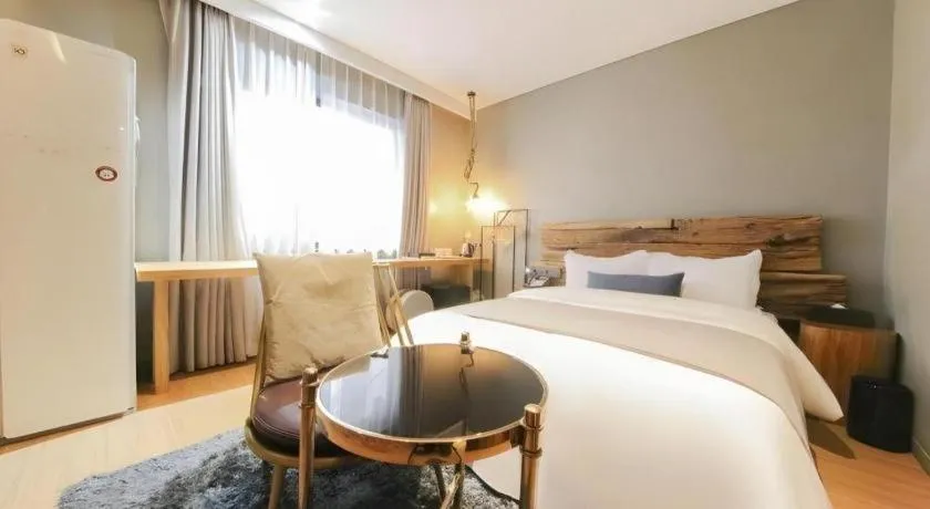 Bed in Daejeon Namoo Hotel