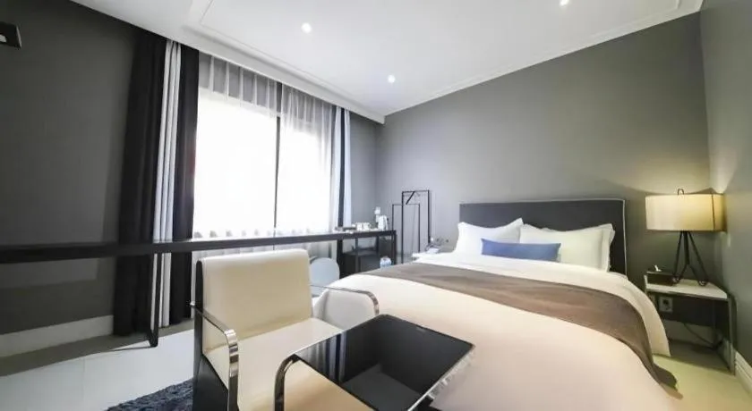 Bed in Daejeon Namoo Hotel