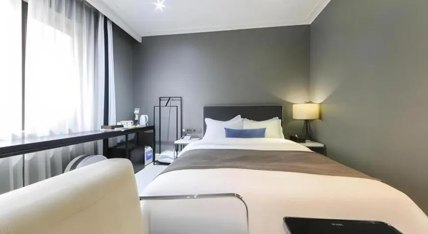 Bed in Daejeon Namoo Hotel