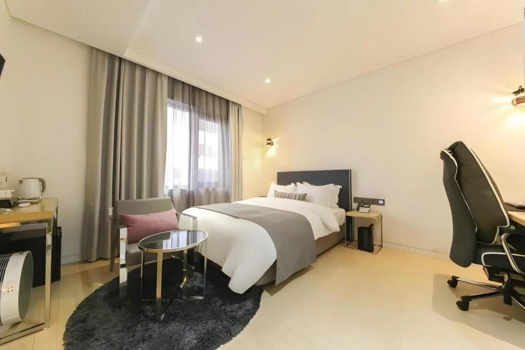 Bed in Daejeon Namoo Hotel