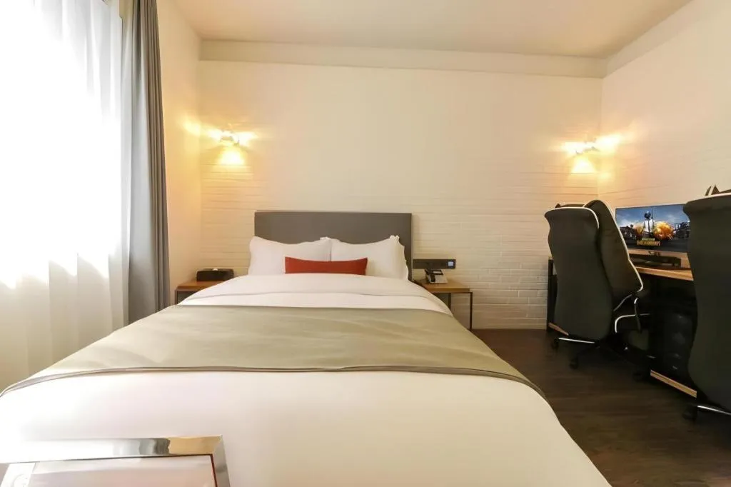 Bed in Daejeon Namoo Hotel