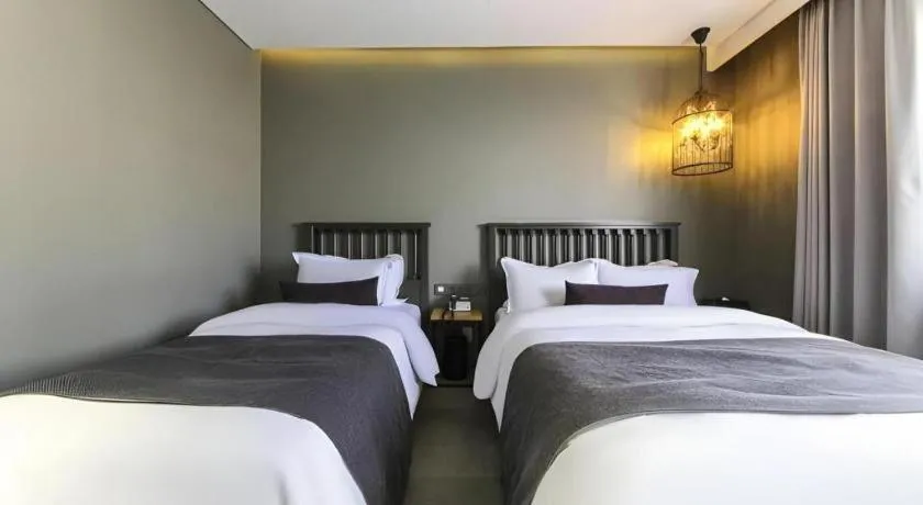 Bed in Daejeon Namoo Hotel