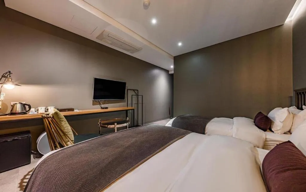 Bed in Daejeon Namoo Hotel