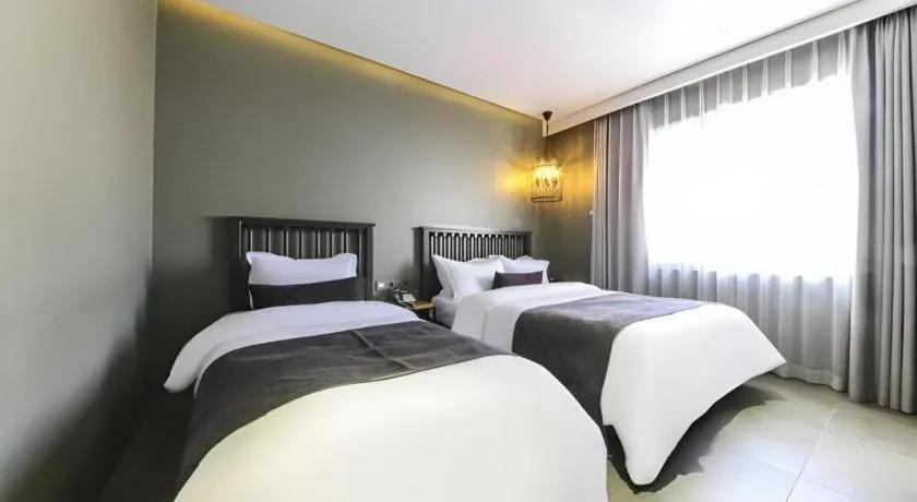 Bed in Daejeon Namoo Hotel