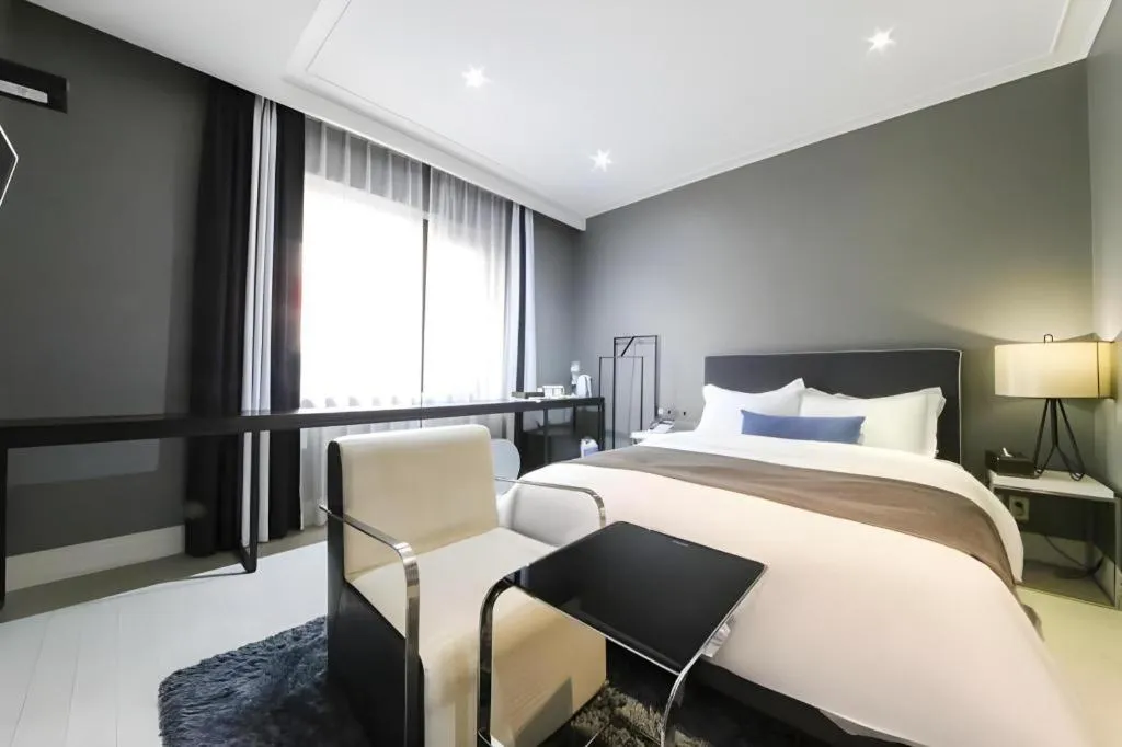 Bed in Daejeon Namoo Hotel