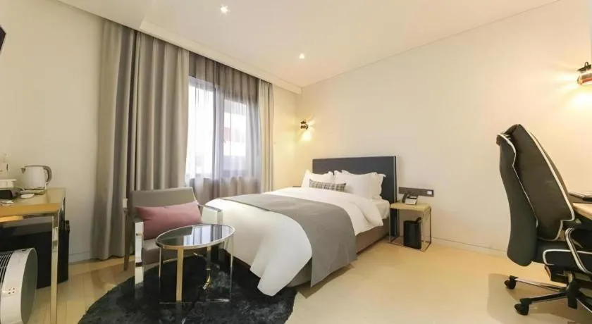 Bed in Daejeon Namoo Hotel