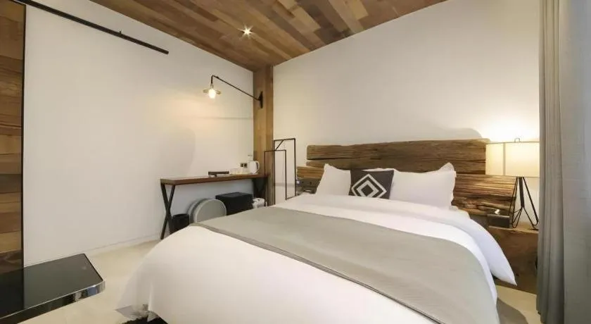 Bed in Daejeon Namoo Hotel