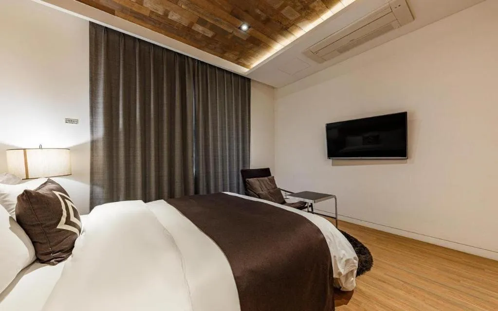 Bed in Daejeon Namoo Hotel
