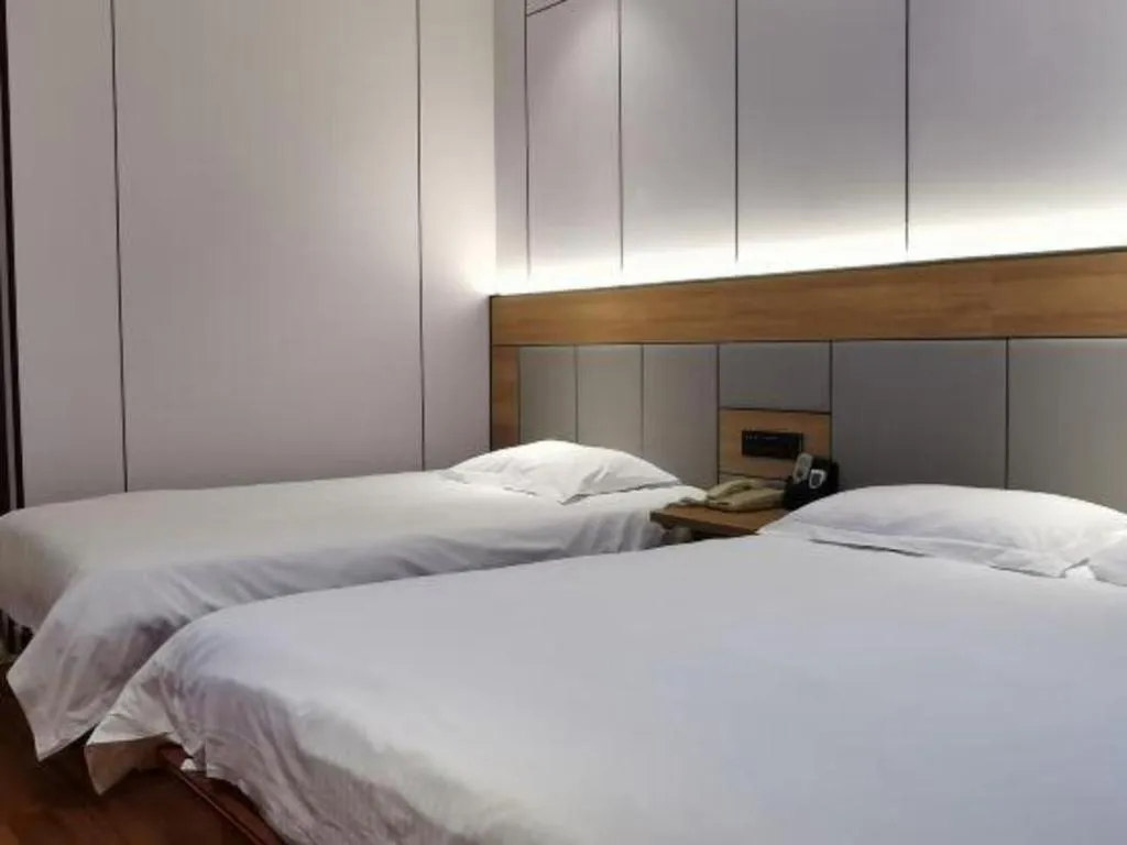 Bed in GreenTree Inn Shanghai Hongqiao Hub Convention Center Jinghua Road Shell Hotel