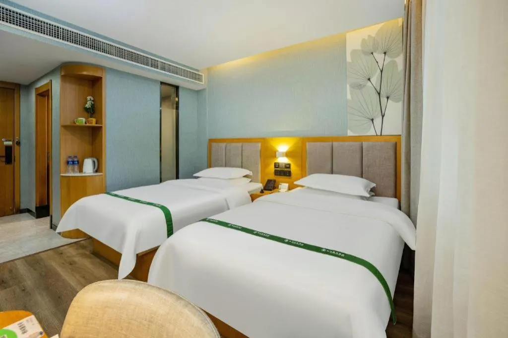 Bed in GreenTree Inn Puyang Ruifengyuan Business Hotel