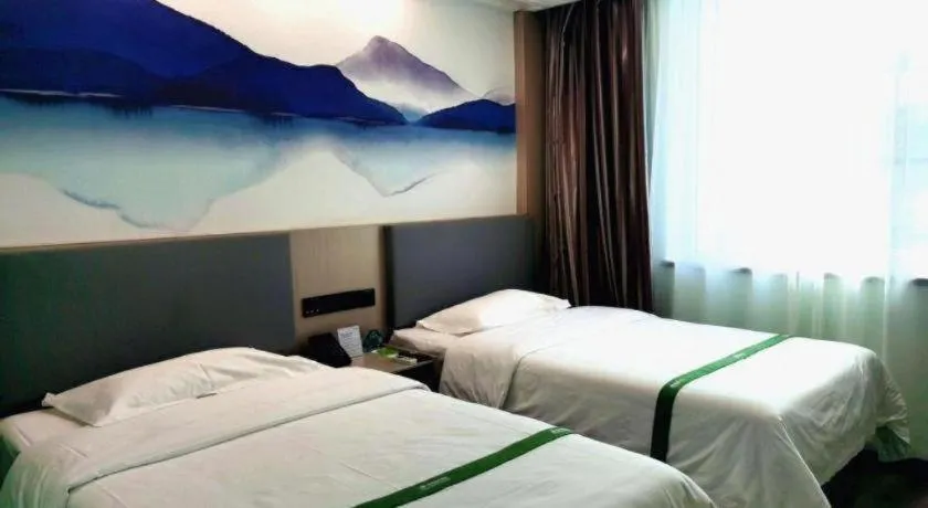 Bed in GreenTree Inn Puyang Ruifengyuan Business Hotel