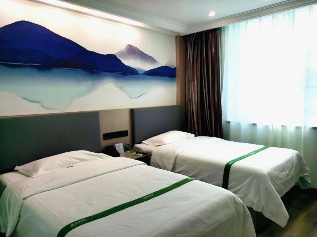 Bed in GreenTree Inn Puyang Ruifengyuan Business Hotel