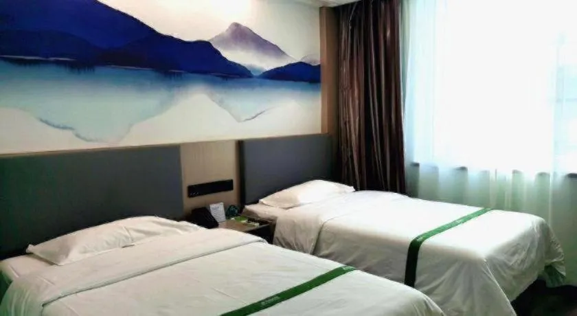 Bed in GreenTree Inn Puyang Ruifengyuan Business Hotel
