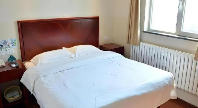 Bed in GreenTree Inn Beijing East Yizhuang District Second Kechuang Street Express Hotel