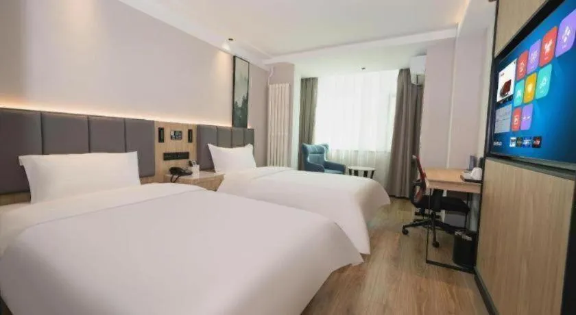 Bed in GreenTree Inn Beijing Capital Airport New International Exhibition Center Express Hotel
