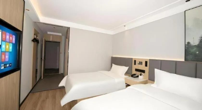 Bed in GreenTree Inn Beijing Capital Airport New International Exhibition Center Express Hotel