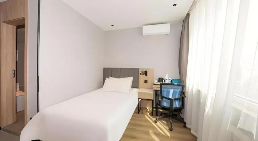 Bed in GreenTree Inn Beijing Capital Airport New International Exhibition Center Express Hotel