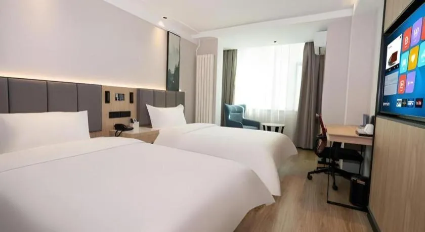 Bed in GreenTree Inn Beijing Capital Airport New International Exhibition Center Express Hotel