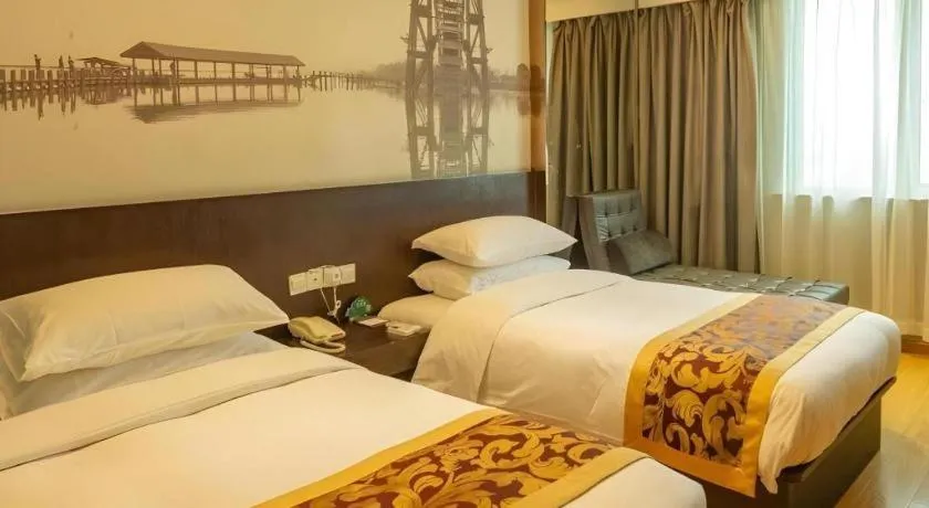 Bed in GreenTree Inn Huzhou South Street Chaoyin Bridge Business Hotel