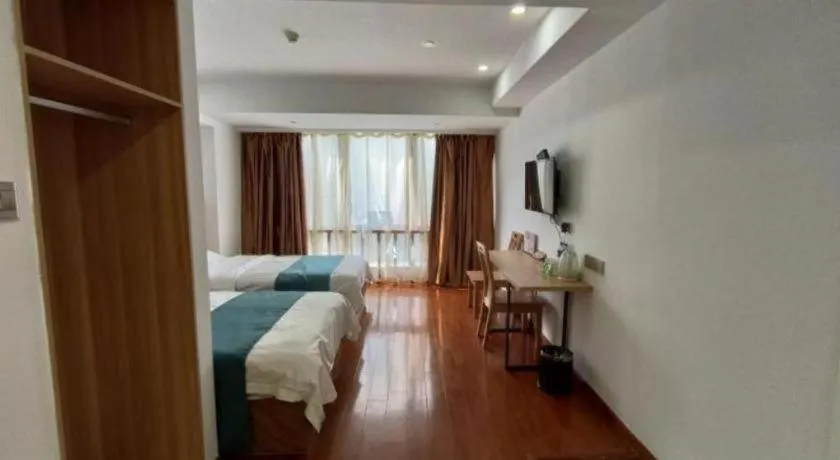 Bed in GreenTree Inn Changshu Zhaoshangcheng Express Hotel