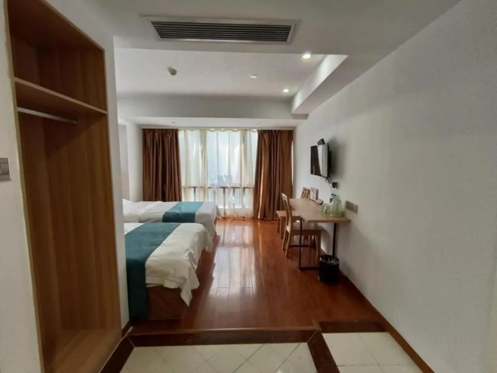 Bed in GreenTree Inn Changshu Zhaoshangcheng Express Hotel