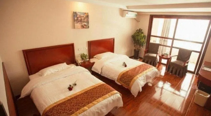 Bed in GreenTree Inn Lianyungang Guanyun Bus Station Zhenxing Garden Express Hotel
