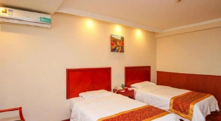 Bed in GreenTree Inn Lianyungang Guanyun Bus Station Zhenxing Garden Express Hotel