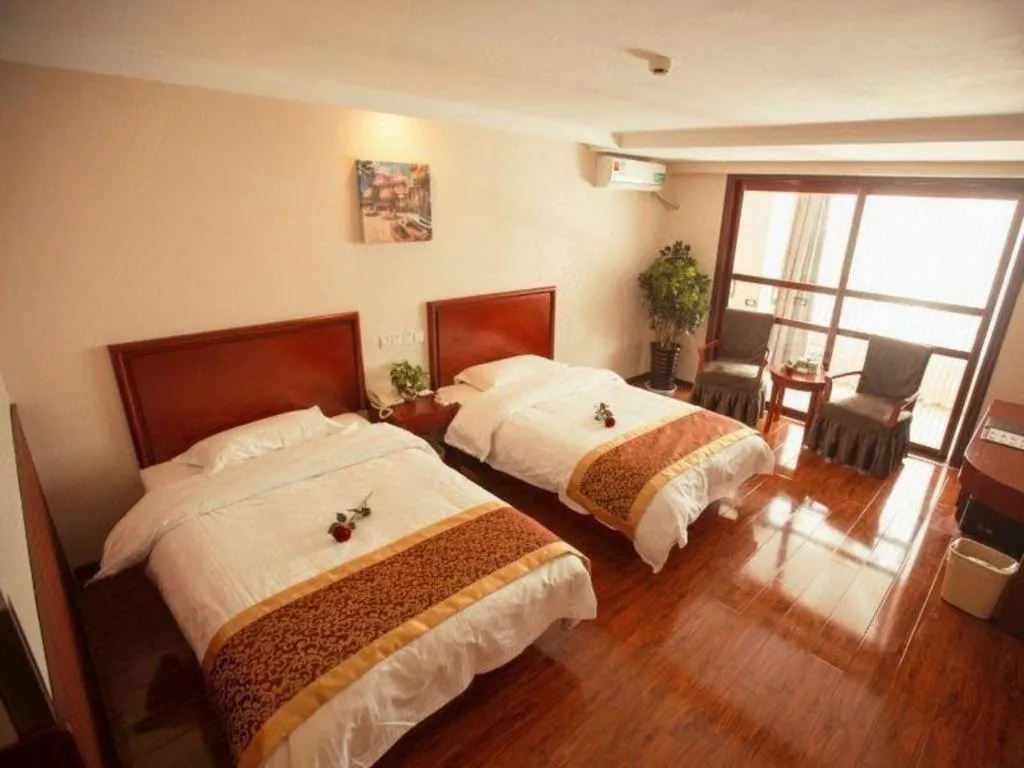Bed in GreenTree Inn Lianyungang Guanyun Bus Station Zhenxing Garden Express Hotel