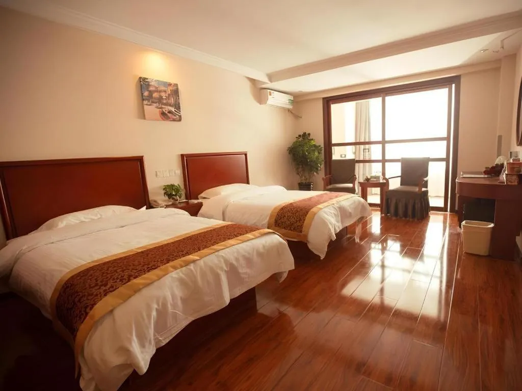 Bed in GreenTree Inn Lianyungang Guanyun Bus Station Zhenxing Garden Express Hotel