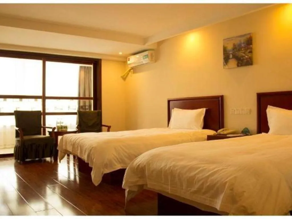Bed in GreenTree Inn Lianyungang Guanyun Bus Station Zhenxing Garden Express Hotel
