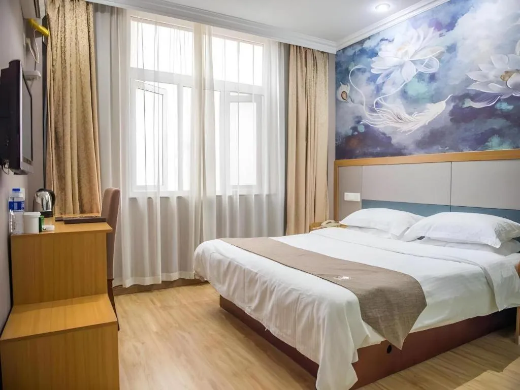 Bed in GreenTree Inn Zhejiang Ningbo Exhibition and Convention Center Bus East Station Express Hotel