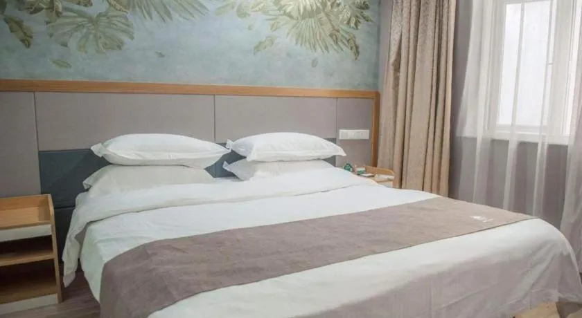 Bed in GreenTree Inn Zhejiang Ningbo Exhibition and Convention Center Bus East Station Express Hotel