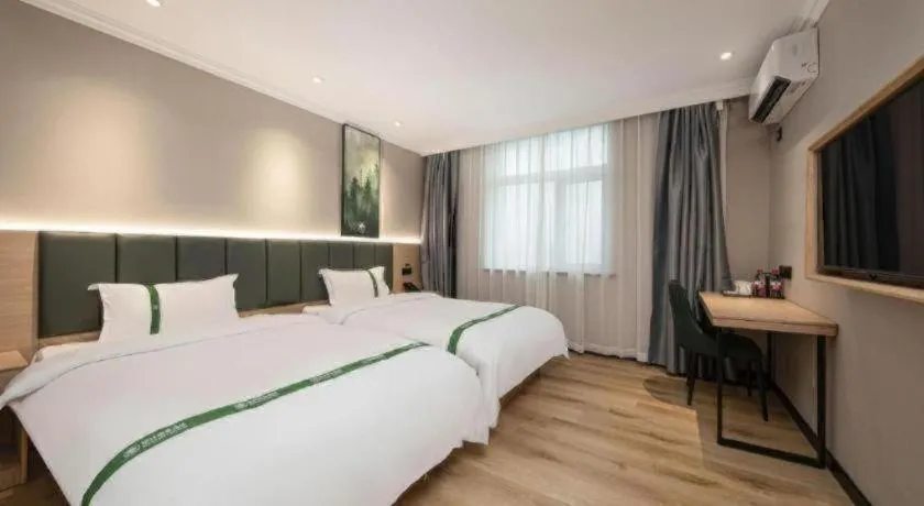 Bed in GreenTree Inn Zhejiang Ningbo Exhibition and Convention Center Bus East Station Express Hotel