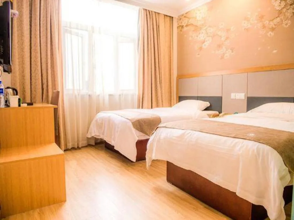 Bed in GreenTree Inn Zhejiang Ningbo Exhibition and Convention Center Bus East Station Express Hotel