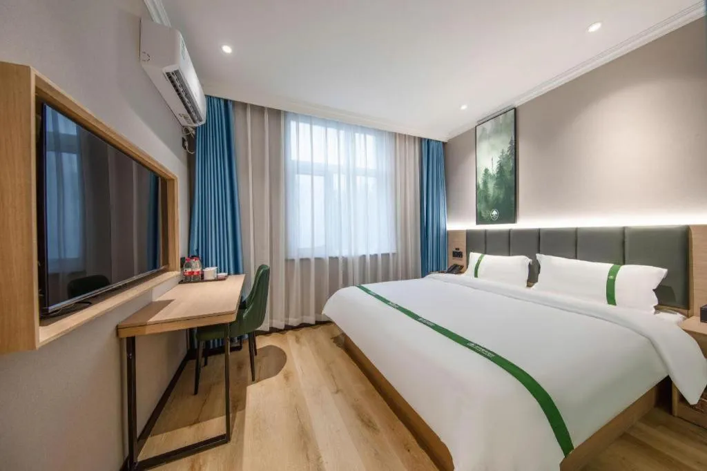 Bed in GreenTree Inn Zhejiang Ningbo Exhibition and Convention Center Bus East Station Express Hotel