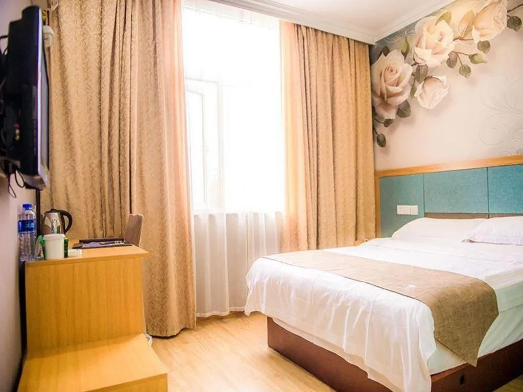 Bed in GreenTree Inn Zhejiang Ningbo Exhibition and Convention Center Bus East Station Express Hotel