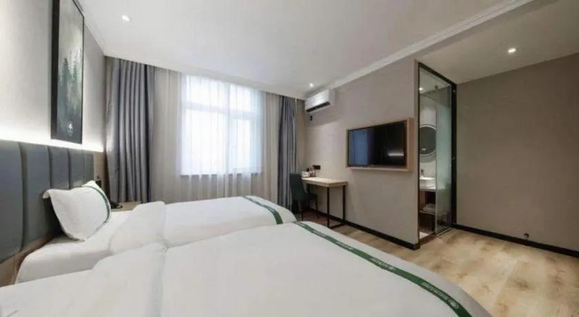 Bed in GreenTree Inn Zhejiang Ningbo Exhibition and Convention Center Bus East Station Express Hotel