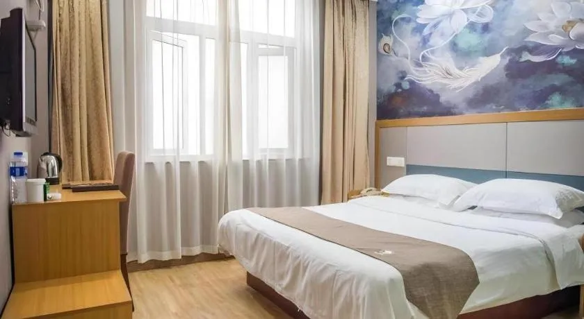 Bed in GreenTree Inn Zhejiang Ningbo Exhibition and Convention Center Bus East Station Express Hotel