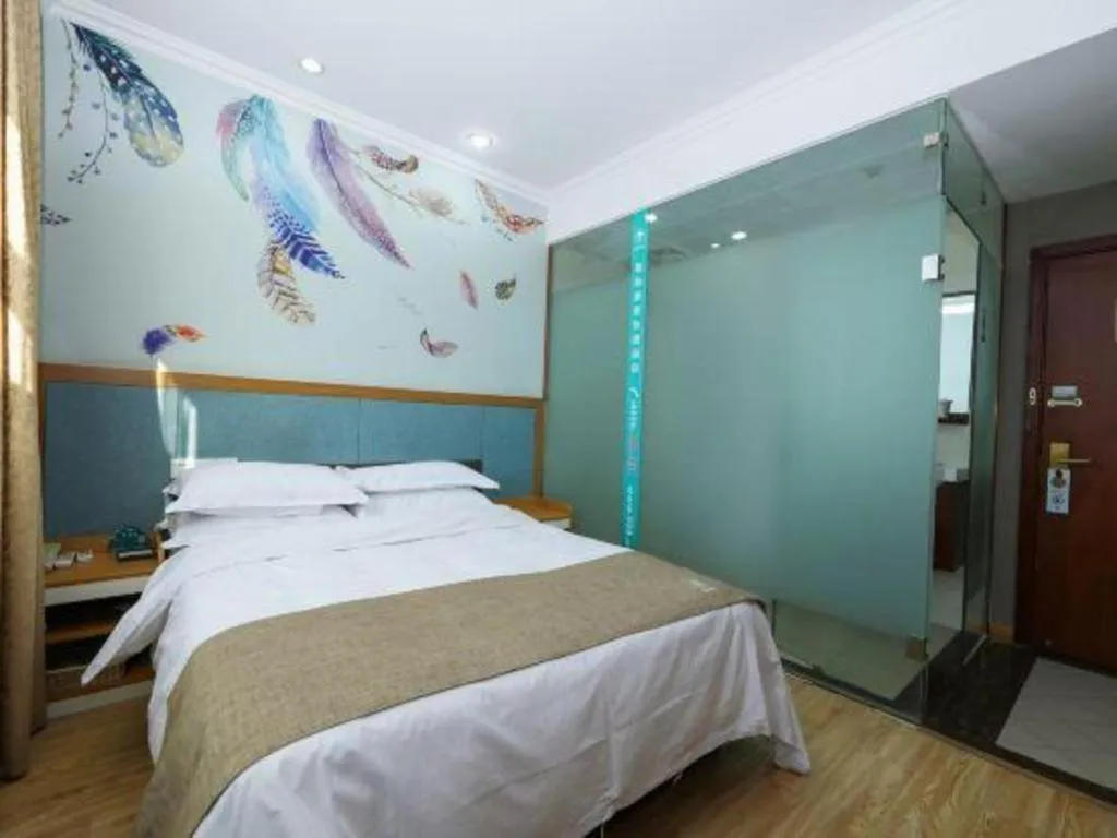 Bed in GreenTree Inn Zhejiang Ningbo Exhibition and Convention Center Bus East Station Express Hotel