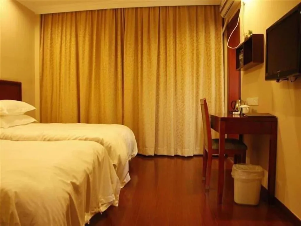 Bed in GreenTree Inn Zhejiang Ningbo Exhibition and Convention Center Bus East Station Express Hotel