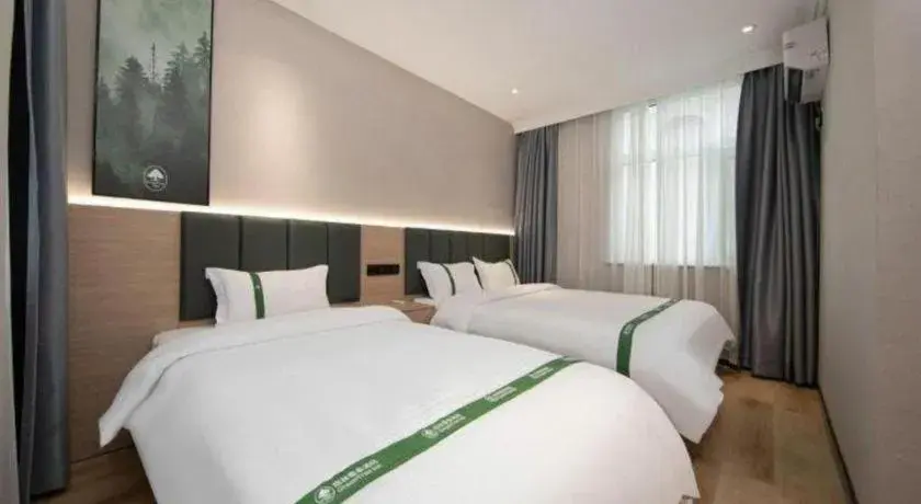 Bed in GreenTree Inn Zhejiang Ningbo Exhibition and Convention Center Bus East Station Express Hotel Bed in GreenTree Inn Zhejiang Ningbo Exhibition and Convention Center Bus East Station Express Hotel