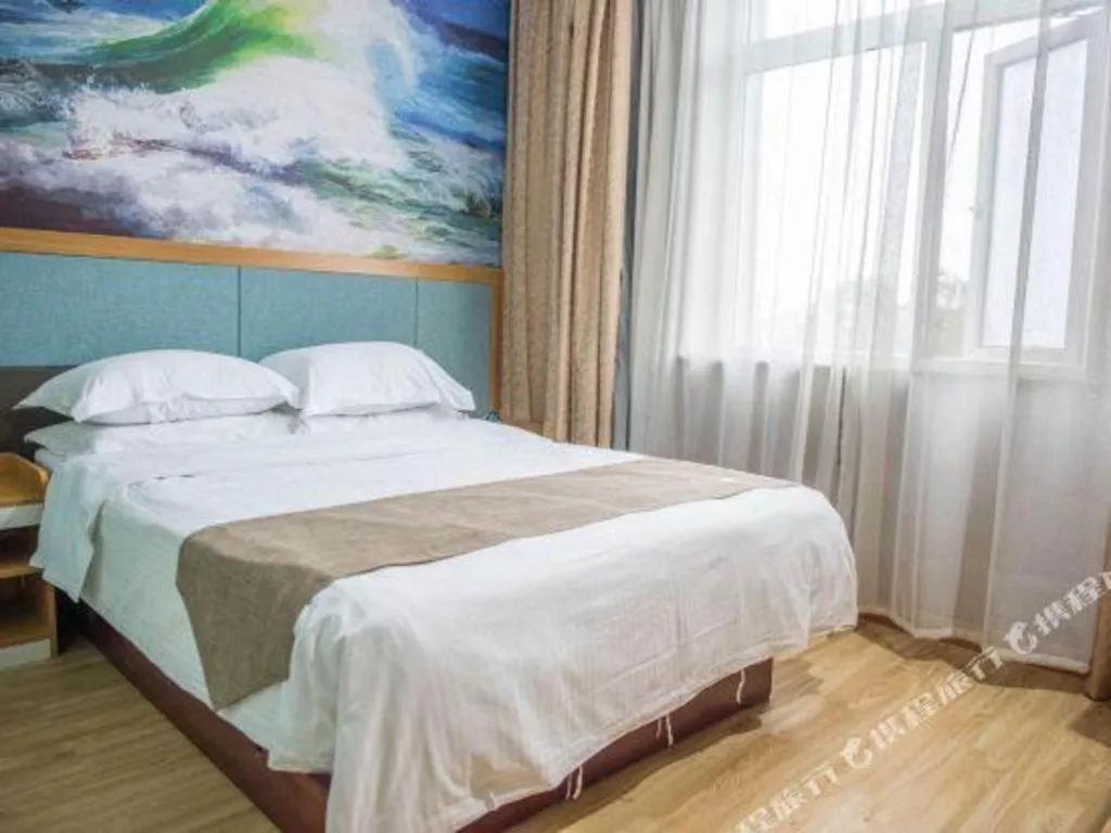 Bed in GreenTree Inn Zhejiang Ningbo Exhibition and Convention Center Bus East Station Express Hotel
