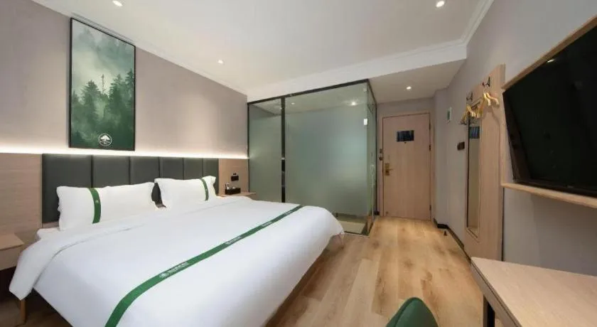 Bed in GreenTree Inn Zhejiang Ningbo Exhibition and Convention Center Bus East Station Express Hotel