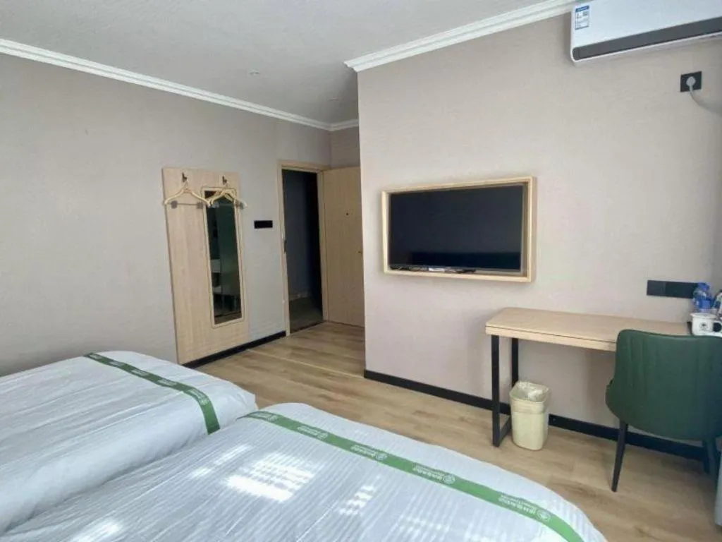 Bed in GreenTree Inn Zhejiang Ningbo Exhibition and Convention Center Bus East Station Express Hotel