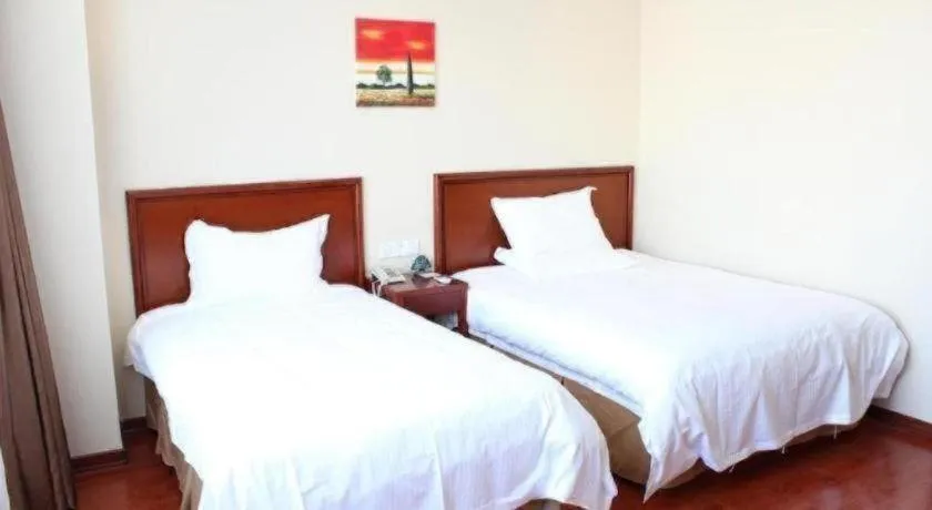 Bed in GreenTree Inn Zhejiang Ningbo Exhibition and Convention Center Bus East Station Express Hotel