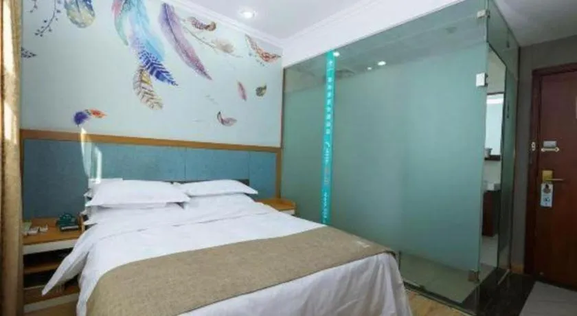 Bed in GreenTree Inn Zhejiang Ningbo Exhibition and Convention Center Bus East Station Express Hotel